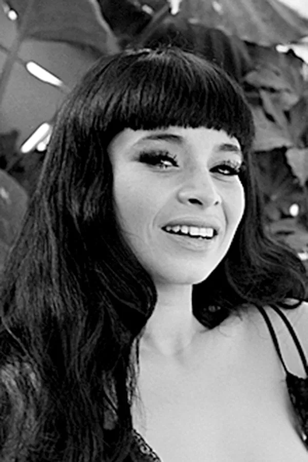 Palva Stano black and white portret smiling black hair.